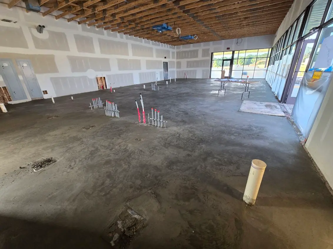 Interior traditional concrete floor for a commercial renovation by OTM Concrete