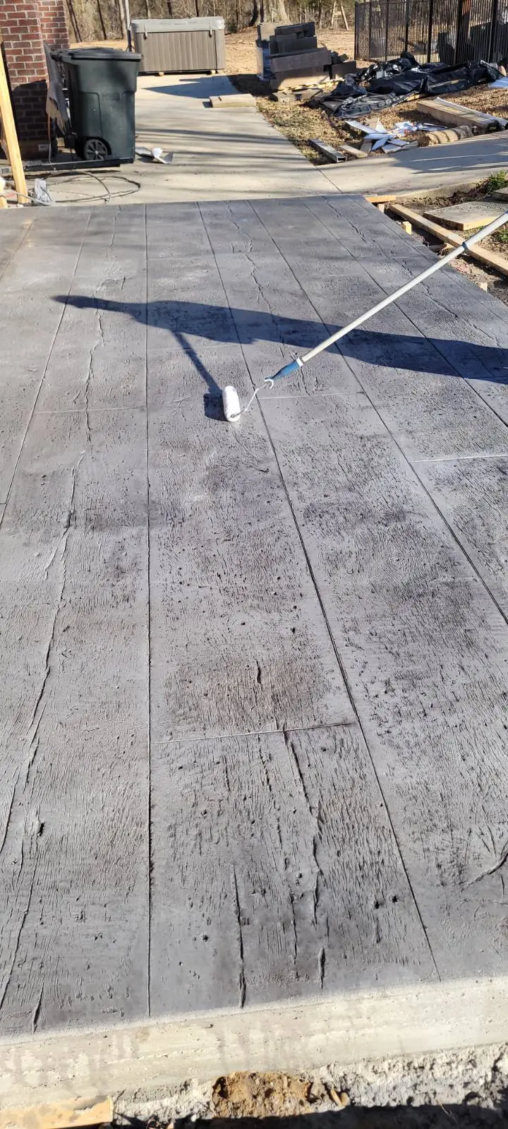 Outdoor stamped concrete patio overlay by OTM Concrete