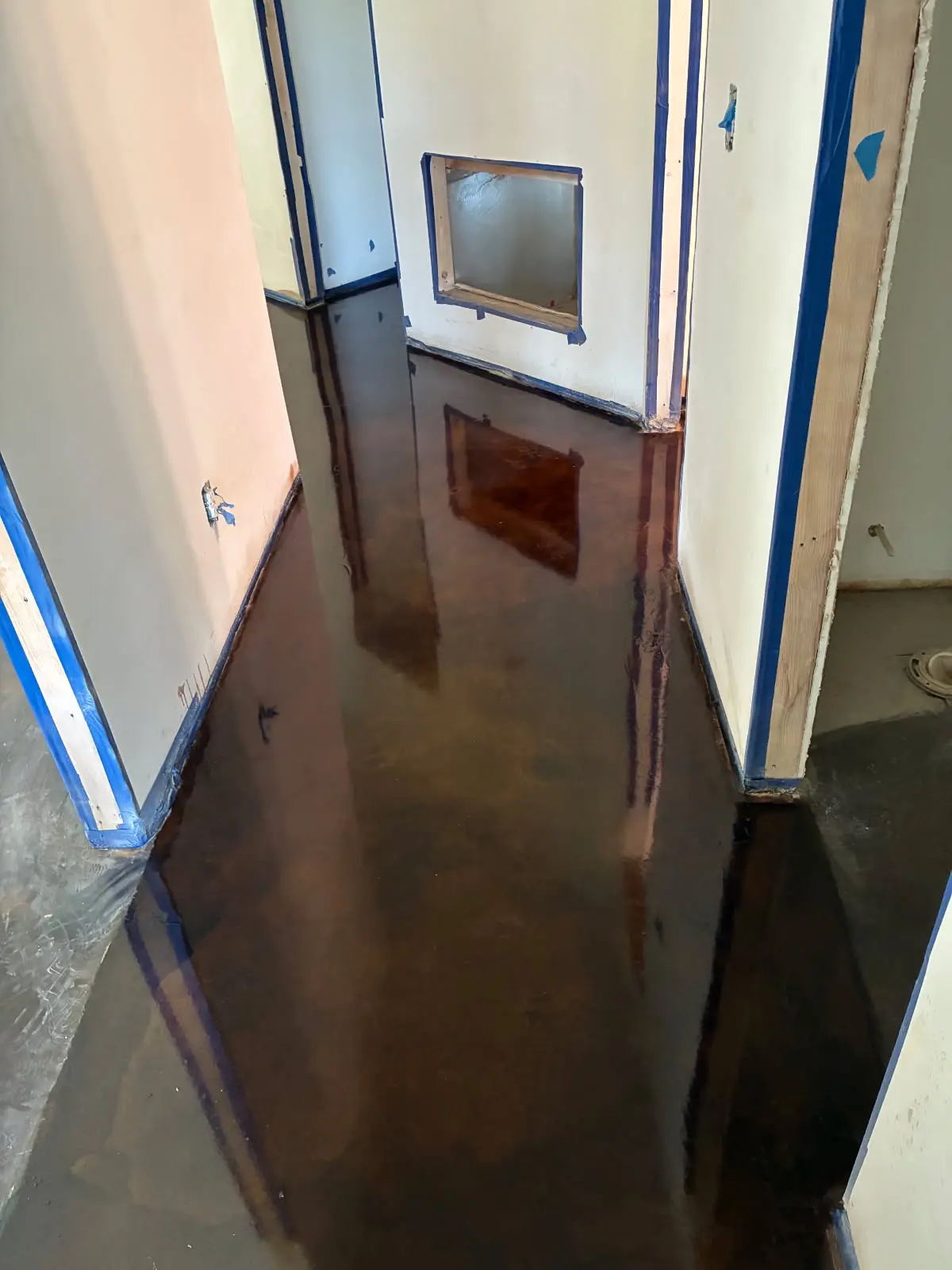 Polished and stained concrete epoxy flooring by OTM Concrete