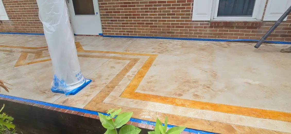 Stamped and stained concrete patio by OTM Concrete